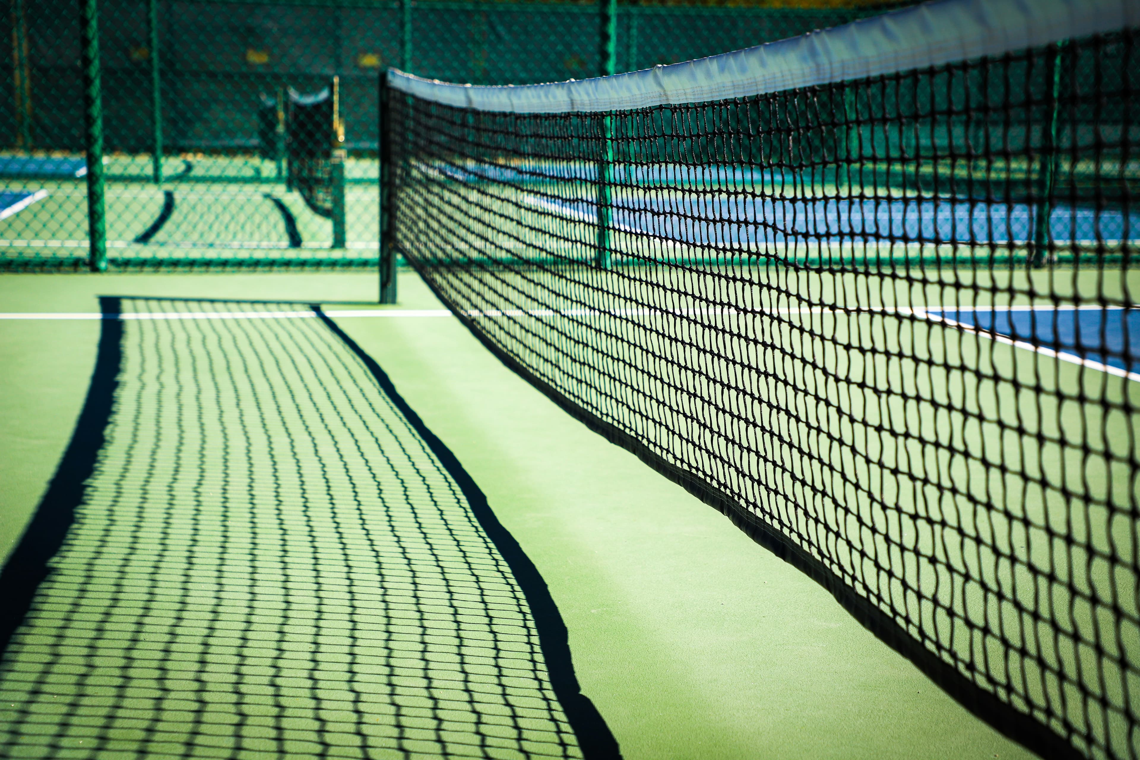 Pickleball players mid game